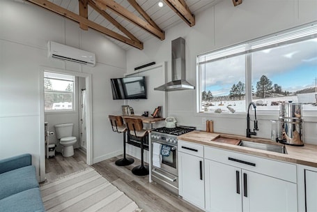 Fridge, oven, stovetop, coffee/tea maker. Charming farm stay in a tiny home on Monture Creek