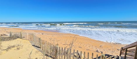 On the beach, sun-loungers, beach towels