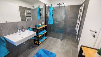Hair dryer, towels, soap, toilet paper