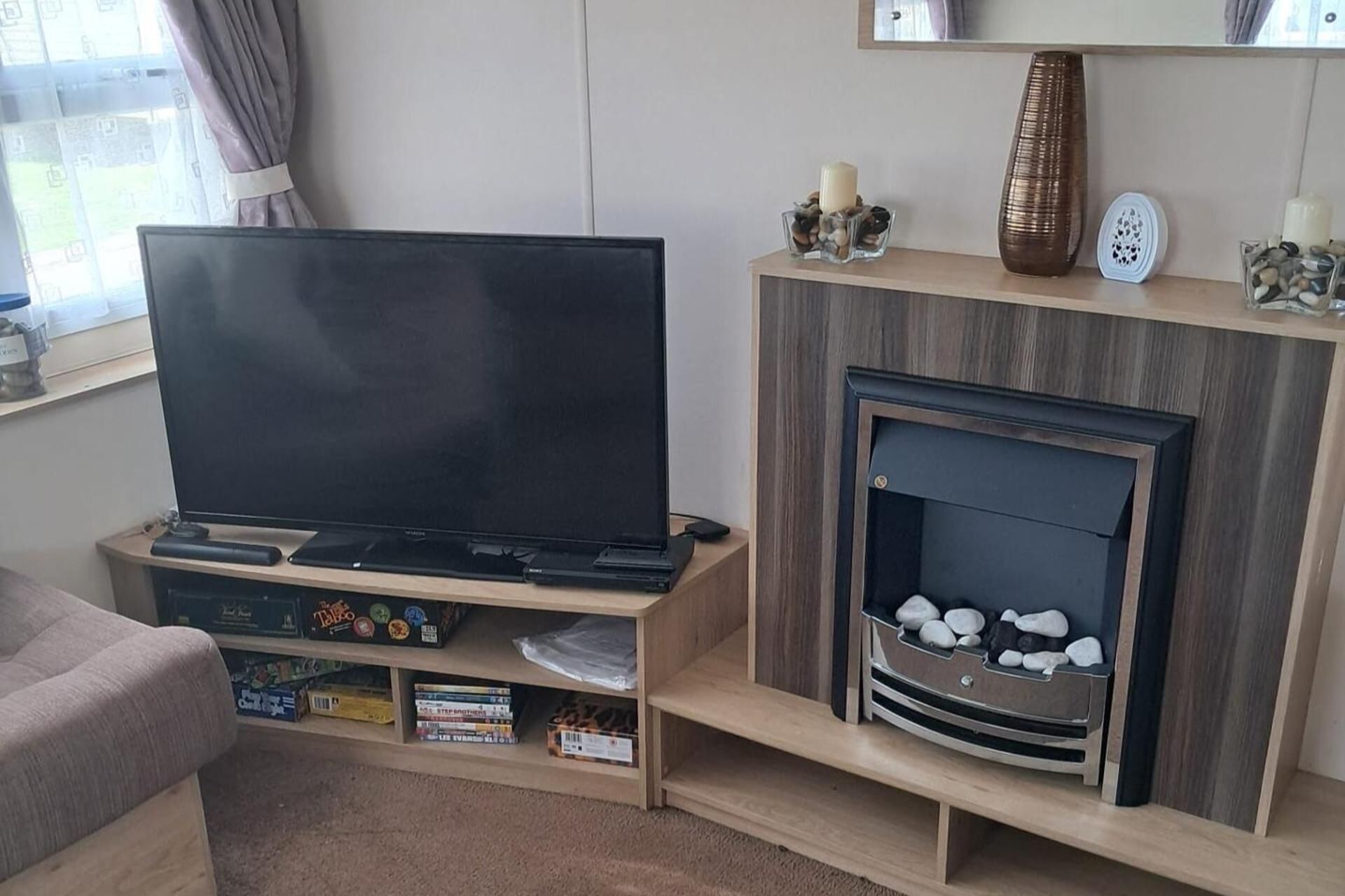 Televisión, chimenea