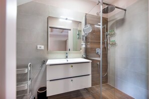 Hair dryer, bidet, towels, soap