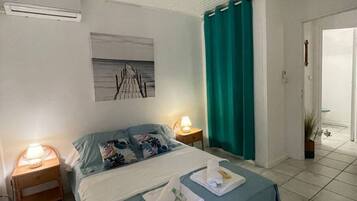 1 dormitorio, tabla de planchar con plancha, cuna de viaje y wifi gratis