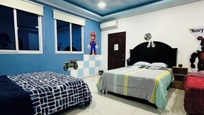 A bedroom with two beds, a window, an air conditioner, and a wall decoration. - Spacious 4 bedroom&Pool and 2 jacuzzis, WiFi, AC In Amazing area in San Salvador (San Salvador)
