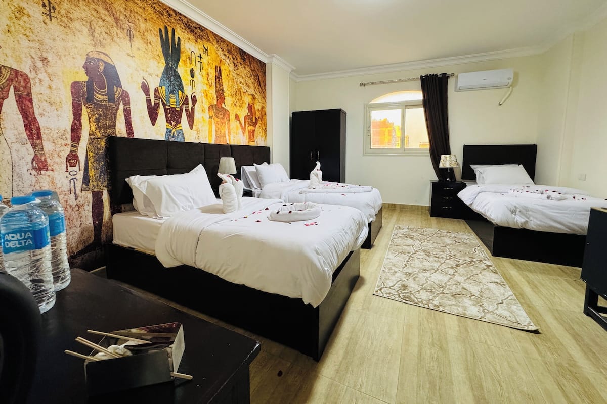 Triple Room, City View | Minibar, in-room safe, free WiFi, bed sheets