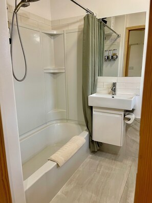Hair dryer, towels, soap, toilet paper