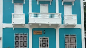 A two-story building with a blue facade, white balconies, and a sign reading "Casa de la Cultura". - Casa Turbay 11 (Cartagena de Indias)