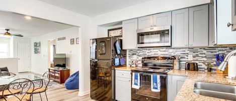Fridge, microwave, stovetop, coffee/tea maker