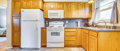 Fridge, microwave, stovetop, coffee/tea maker