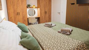 2 dormitoris, un bressol de viatge, wifi gratuïta i roba de llit