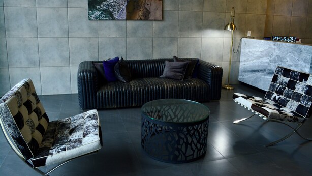 A modern living room with a sofa, armchair, and coffee table. - Welcome to Ruelle505 (Tijuana)