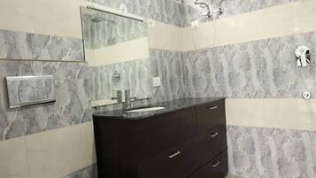 Shower, towels, soap, shampoo