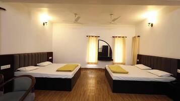 Quartos à prova de som, Wi-Fi de cortesia, roupa de cama