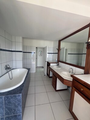 Shower, towels, soap, toilet paper