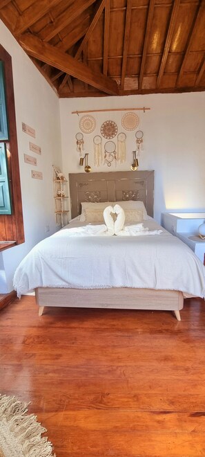 1 bedroom, desk, iron/ironing board, travel crib