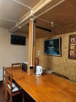 Comfort Shared Dormitory, Mixed Dorm | Private kitchen | Fridge, microwave - Worlds Hostel (Puerto Natales)