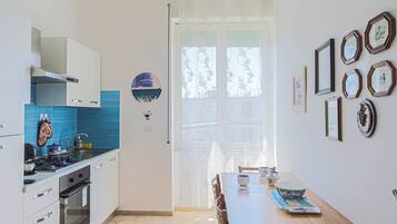 Comfort Apartment, City View | Private kitchen | Electric kettle