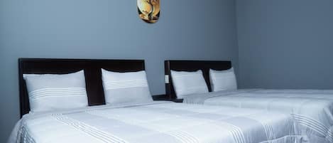 Exclusive Suite, Multiple Beds, Kitchenette, Courtyard View | 1 bedroom, iron/ironing board, free WiFi