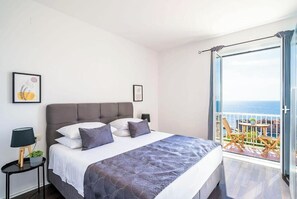 Deluxe Apartment, 1 Bedroom, Balcony, Sea View | In-room safe, soundproofing, iron/ironing board, free WiFi