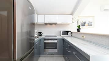 Apartamento Deluxe, 1 habitación, vistas al mar | Zona de estar