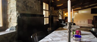 Old house in the mountain made of stone, rock and wood. Private garden and barbecue