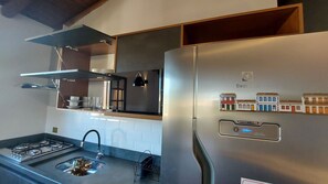 Fridge, microwave, toaster, cookware/dishes/utensils