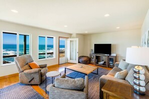 Smart TV, chimenea, videojuegos, mesa de ping pong