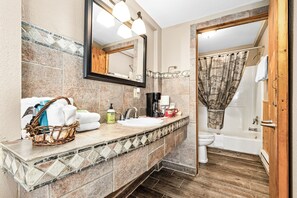 Hair dryer, towels, soap, toilet paper