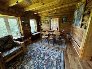 Smart TV, fireplace, books, computer monitors