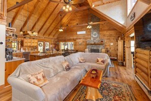 Smart TV, fireplace, books, printers