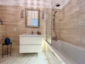 Hair dryer, towels, soap, shampoo