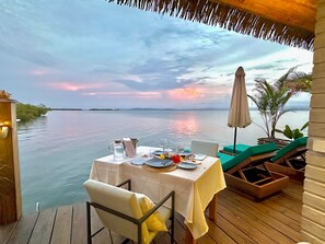 Outdoor dining - Ocean Light Over Water Bungalow, Bedroom, King Bed, Living Room, Kitchenette (Bocas del Toro)