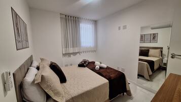 3 quartos, berço de viagem, Wi-Fi de cortesia, roupa de cama