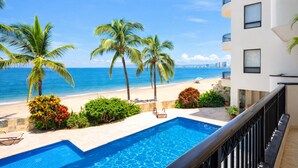 A swimming pool with a view of the beach and ocean. - Oceanfront Paradise | Pool & Walk-Out Beach Access (Puerto Vallarta)