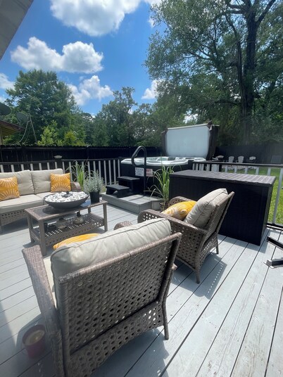 Tiny house with hot tub, kids play area, and fire pit