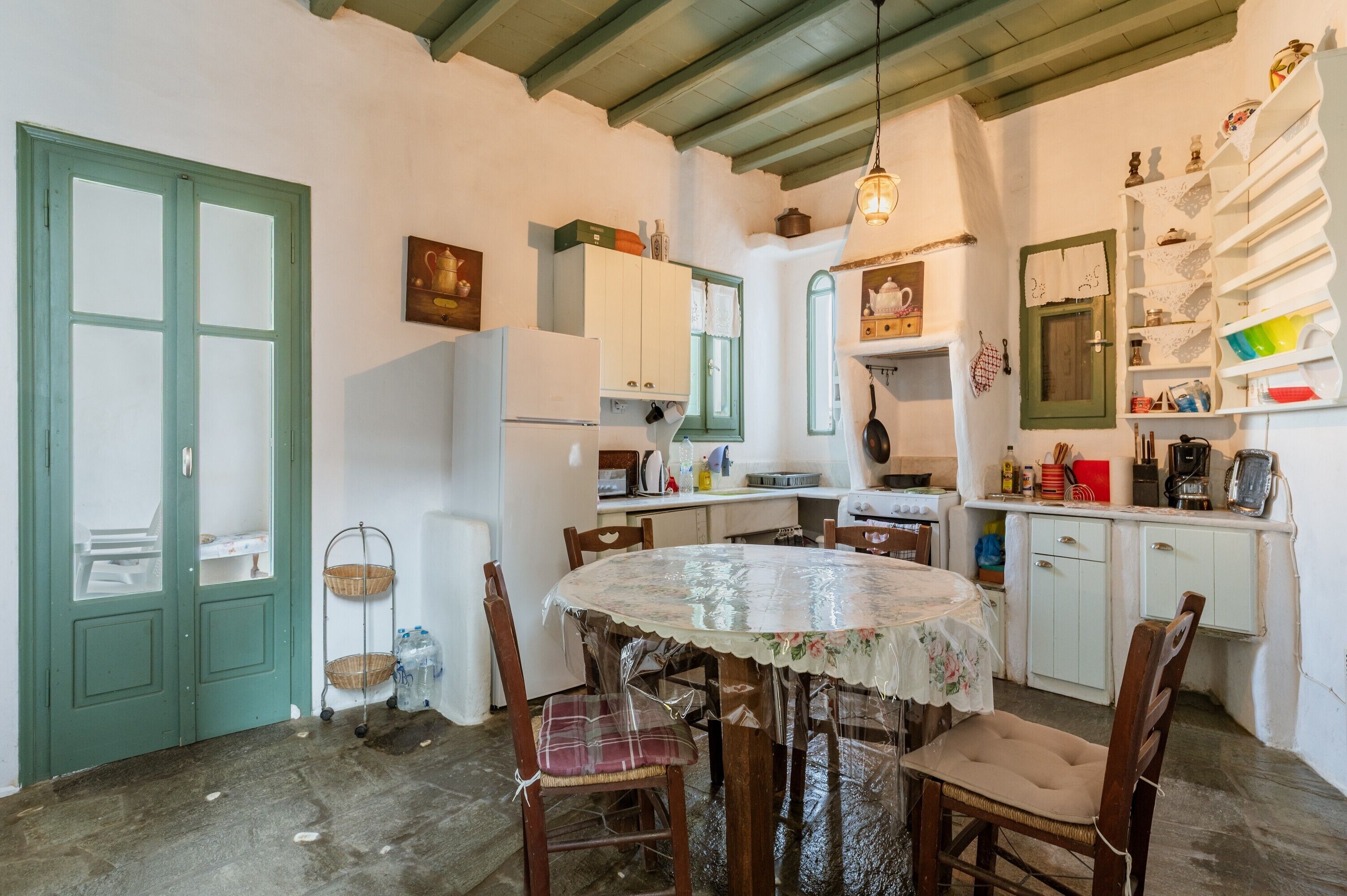 Fridge, dishwasher, coffee/tea maker, cookware/dishes/utensils