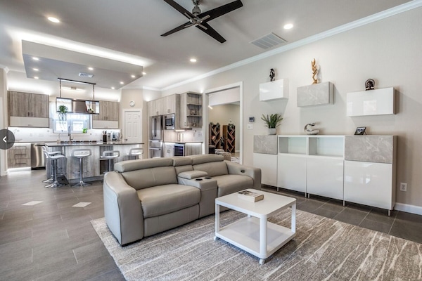 Contemporary, cozy living room with stylish and modern decor.