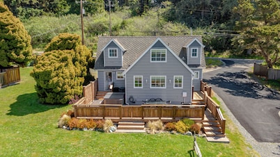Wild ocean views, wrap-a-round deck, hot tub, expansive grounds with shared picnic tables
