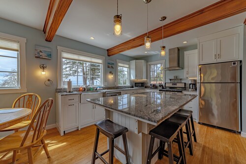 Wild ocean views, wrap-a-round deck, hot tub, expansive grounds with shared picnic tables