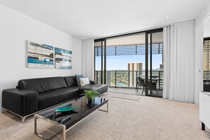 Luxury Apartment, 1 Bedroom, City View | Living area | 40-inch Smart TV with cable channels