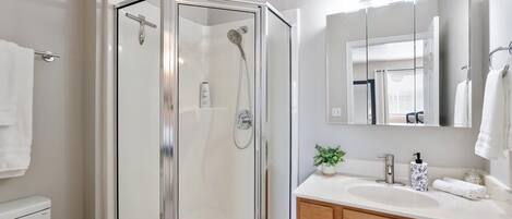 Shower, hair dryer, towels, soap