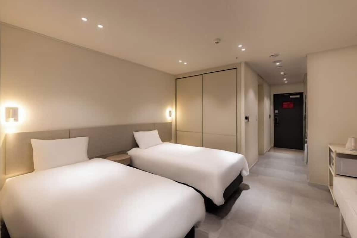 Blackout curtains, free WiFi, bed sheets