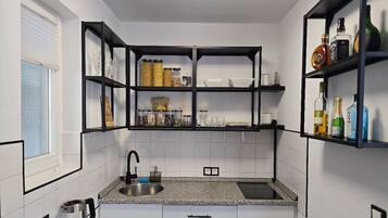 Microwave, stovetop, toaster, cookware/dishes/utensils