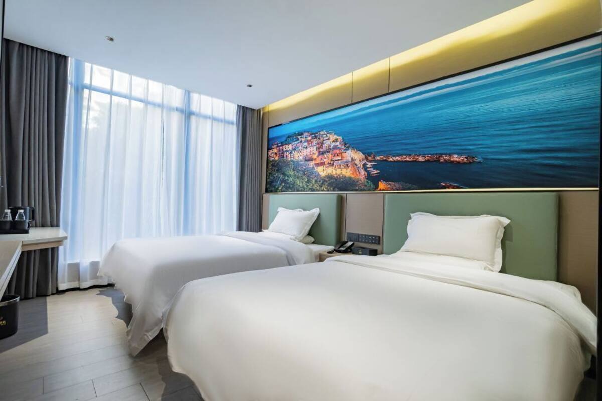 Habitación Deluxe doble, 2 camas dobles, baño privado, vistas a la ciudad | Vistas desde la habitación