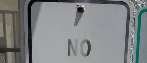 A sign that reads "NO PETS ALLOWED".