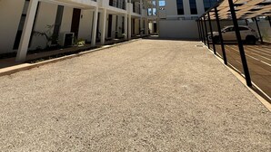 A multi-story building with a flat roof and balconies. - Apartment with Private Rooftop. Start your adventure here at Zefira - 2BR. (Mérida)