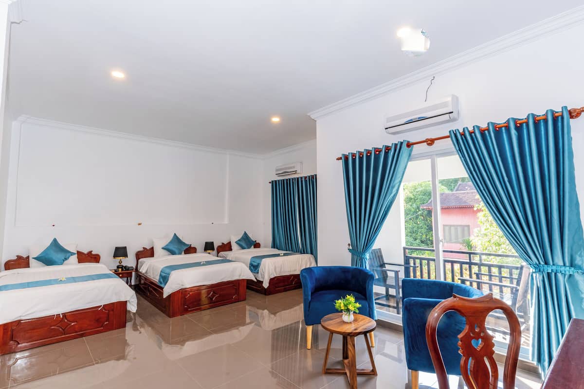 Deluxe Triple Room | Garden view