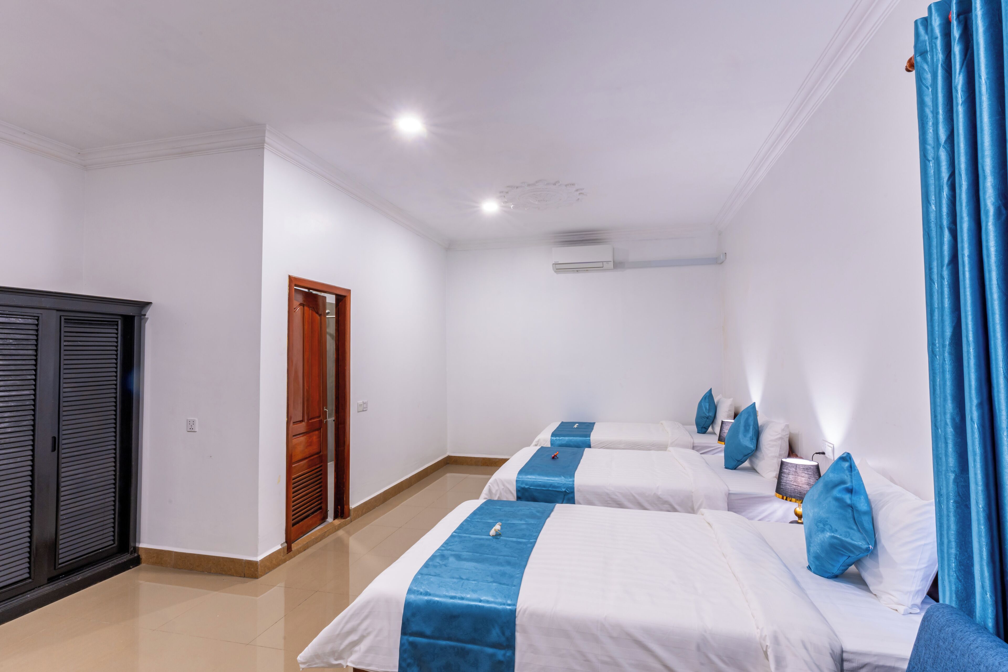 Habitación triple Deluxe | Caja de seguridad en la habitación, escritorio y wifi gratis 