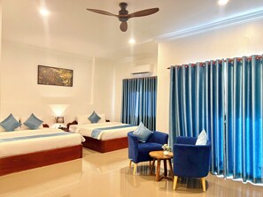Family Room | In-room safe, desk, free WiFi, bed sheets - Rithy Rin Angkor Hotel (Siem Reap)