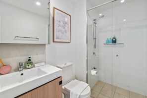 Shower, hair dryer, towels, soap