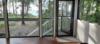 Pet friendly beachfront home in Hervey Bay. Sleeps 8.